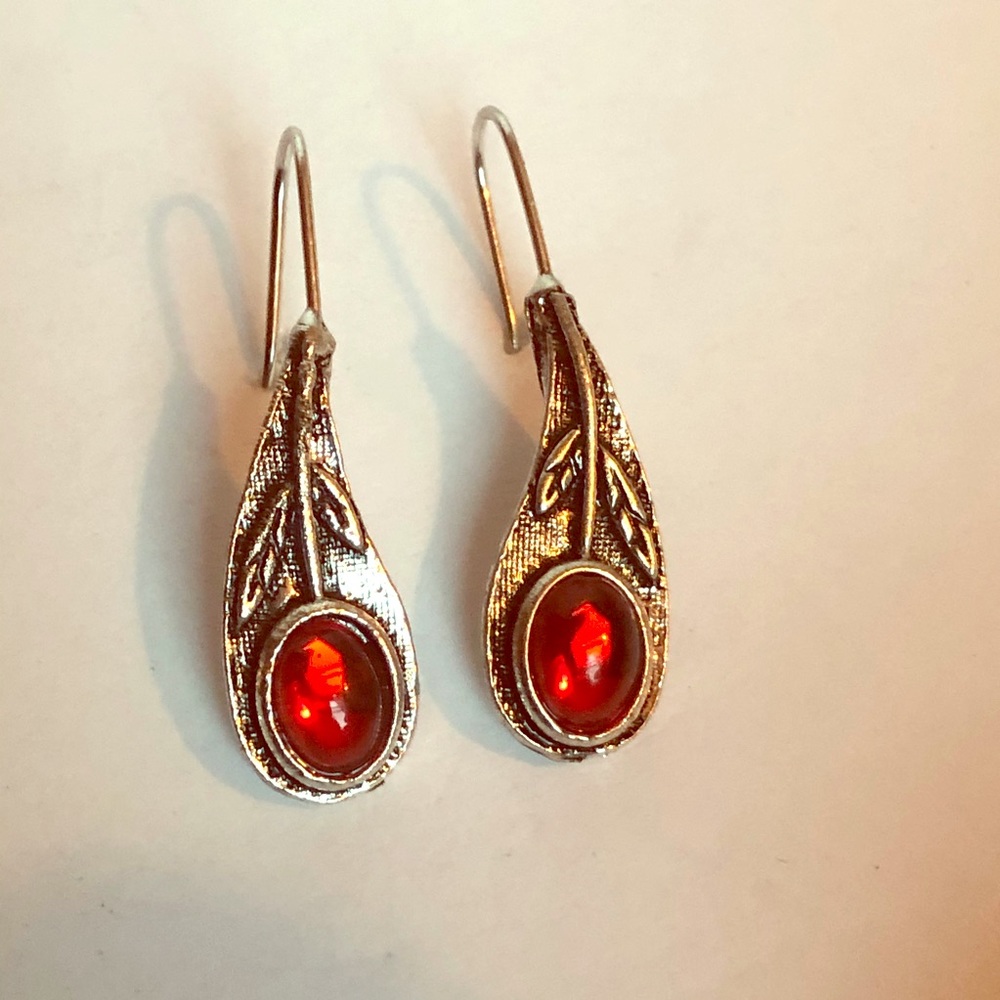 Aged gold with ruby in the center earrings